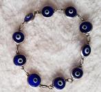 Armband met blauwe steen ogen, Ophalen of Verzenden, Zo goed als nieuw, Blauw
