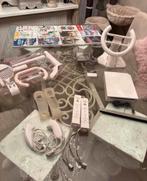 Completen wii met 12spellen en veel hulpstukken, Ophalen of Verzenden, Zo goed als nieuw, Met 2 controllers