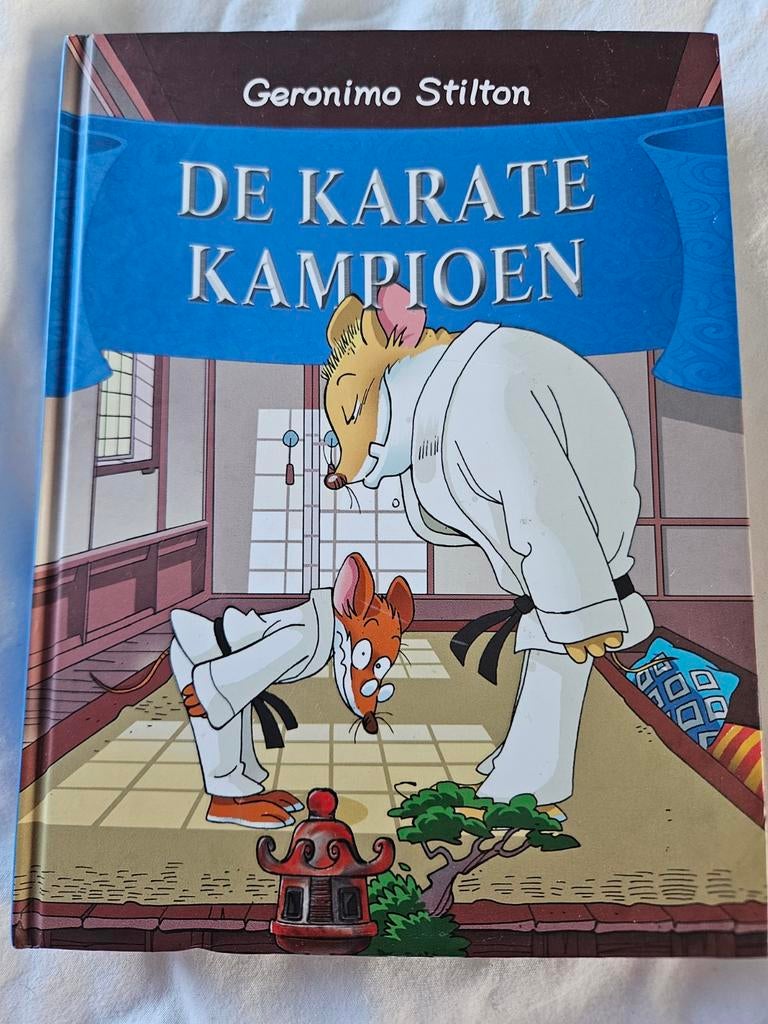 Geronimo Stilton - De karatekampioen, Boeken, Fictie algemeen, Geronimo Stilton, Ophalen of Verzenden, Zo goed als nieuw