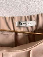 Nukus beige broek maat 38 met toelopende pijpen, Ophalen of Verzenden, Zo goed als nieuw, Maat 38/40 (M), Beige