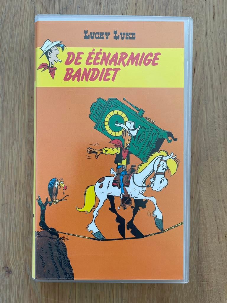 Lucky Luke – De éénarmige bandiet (VHS videoband), Alle leeftijden, Ophalen of Verzenden, Zo goed als nieuw