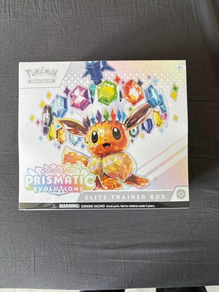 Pokémon Prismatic Evolutions Elite Trainer Box, Ophalen of Verzenden, Nieuw, Overige typen, Foil