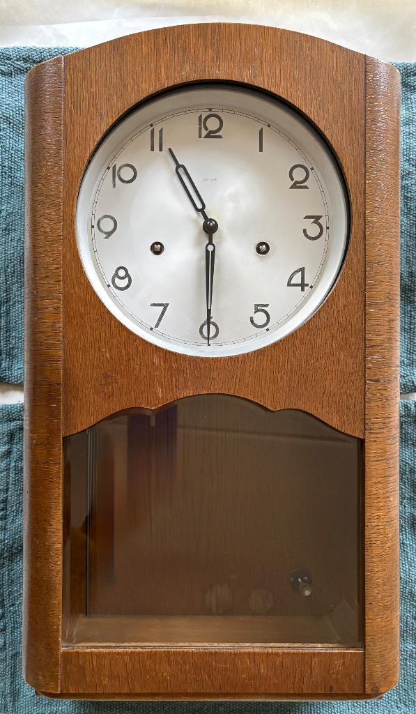 Slingerklok, Ophalen