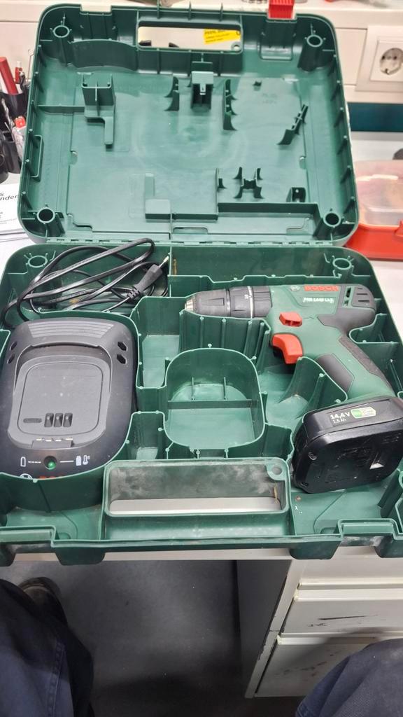 Bosch PSB 1440 LI-2 Accu Boormachine 14,4V met lader, Doe-het-zelf en Verbouw, Gereedschap | Boormachines, Gebruikt, Boor- en Schroefmachine