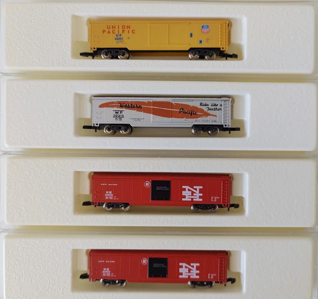 MÄRKLIN Z 4 Amerikaanse goederenwagons (jaren 50) ongebruikt, Ophalen of Verzenden, Zo goed als nieuw, Wagon, Märklin