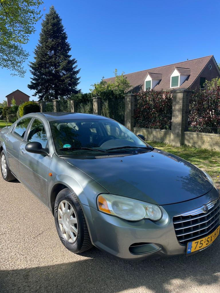 Chrysler Sebring 2.4 I AUT 2006 Grijs, Auto's, Chrysler, 450 kg, Zwart, Leder en Stof, Particulier