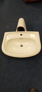 Witte wasbak met sifonkap, Ophalen