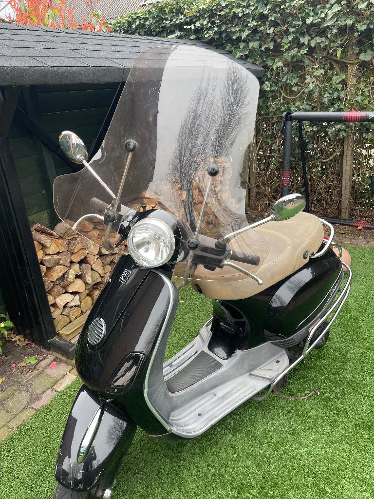 Vespa lx50 4t4v geel kenteken