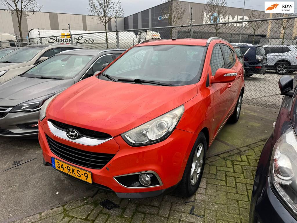 Hyundai Ix35 2.0 CRDi HP 4WD Business Edition, Auto's, Hyundai, Automaat, Euro 5, 4 cilinders, Leder en Stof