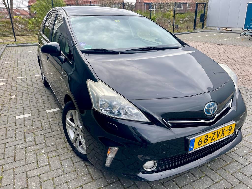 Toyota Prius Wagon 7P Business 2013 Leer Pano Cruise, Auto's, Toyota, Euro 5, 136 pk, Zwart, 4 cilinders