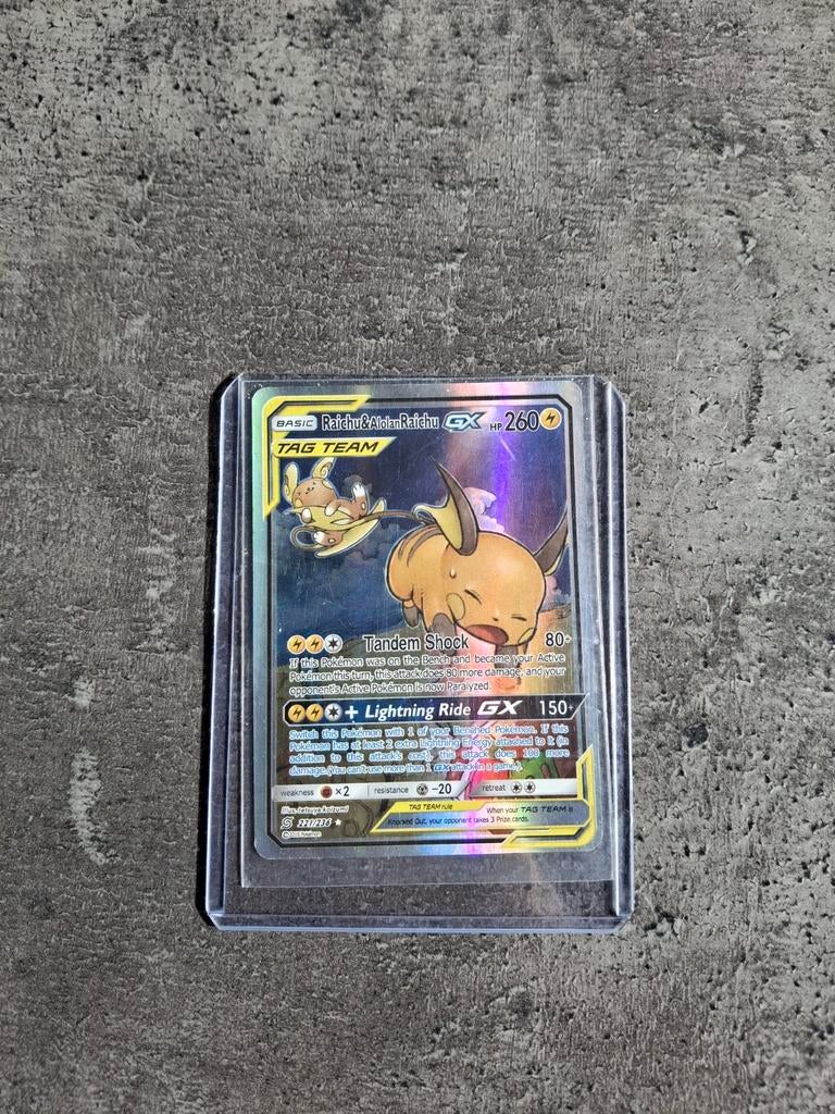Pokemonkaart Raichu & Alolan Raichu GX - Zo goed als nieuw, Hobby en Vrije tijd, Verzamelkaartspellen | Pokémon, Verzenden, Zo goed als nieuw