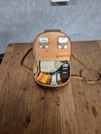 Minolta zoom 8 filmcamera, Ophalen