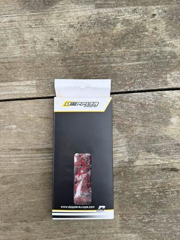 Compleet nieuwe rode brommer ketting van doppler beschikbaar voor biedingen