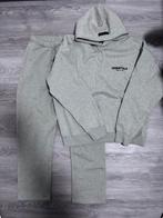 Essentials Trainingspak, Kleding | Dames, Maat 42/44 (L), Nieuw, Ophalen of Verzenden, Grijs