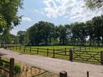 Houten hekwerk hek rijbak paardenbak omheining