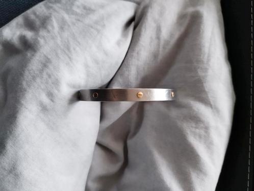 stalen armband 14 karaat gouden schroefjes cartier santos, Sieraden, Tassen en Uiterlijk, Armbanden, Gebruikt, Goud, Goud, Ophalen