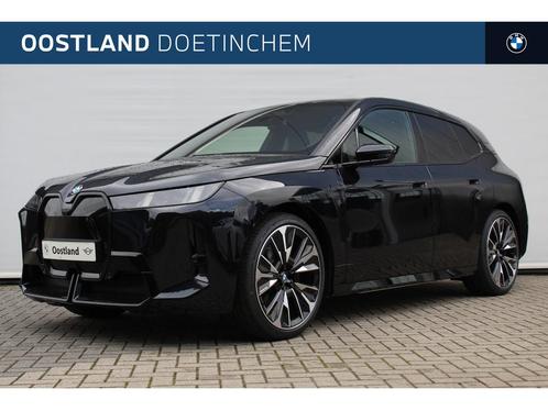 BMW iX xDrive60 M Sport / Panoramadak Sky Lounge / Trekhaak, Auto's, BMW, Bedrijf, Te koop, iX, 4x4, Airconditioning, Bochtverlichting