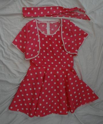 Leuke roze/wit gestipte ROCK & ROLL jurk + haarband/bolero beschikbaar voor biedingen