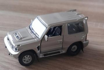Mitsubishi Pajero Evolution 1:43 - Mist 3 wieldopjes beschikbaar voor biedingen