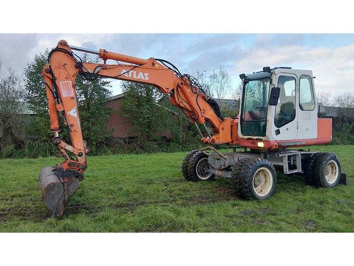 1996 Atlas 1104 Banden graafmachine, Zakelijke goederen, Machines en Bouw | Kranen en Graafmachines, Graafmachine