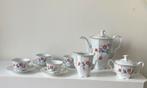 Porseleinen antiek koffie/thee servies met bloemmotief., Ophalen of Verzenden
