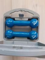 Te koop 2 dumbels van 1kg per stuk in koffertje van Rucanor, Ophalen of Verzenden, Zo goed als nieuw