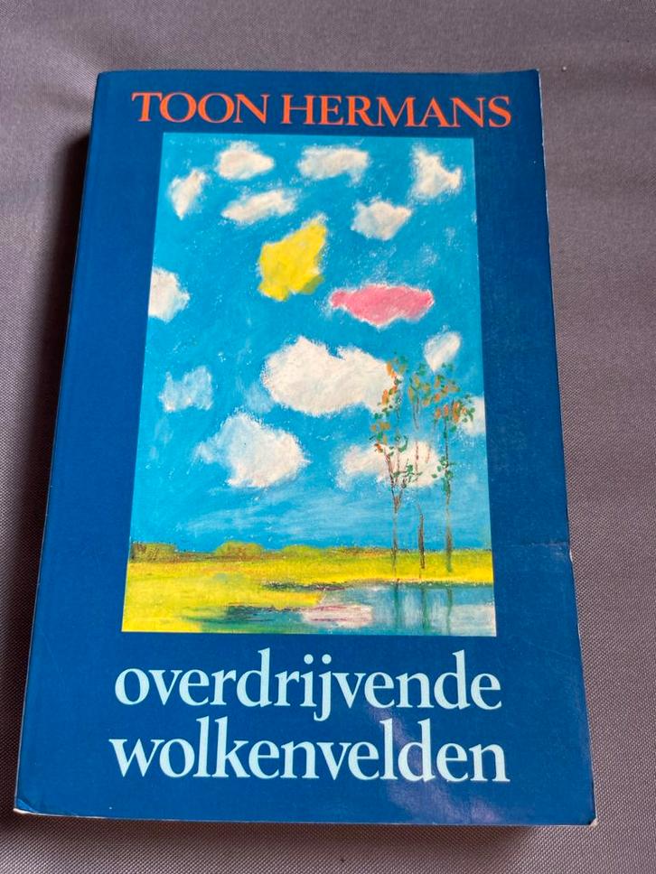 Overdrijvende Wolkenvelden - Toon Hermans, Boeken, Literatuur, Gelezen, Nederland, Ophalen of Verzenden