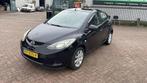 Mazda 2  mazda 2 met airco nieuwe apk, Auto's, Voorwielaandrijving, 4 cilinders, Zwart, Trekhaak