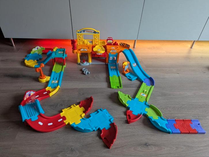 Toettoet auto werkplaats / wasstraat met extra wegdelen, Kinderen en Baby's, Speelgoed | Vtech, Zo goed als nieuw, Ophalen of Verzenden