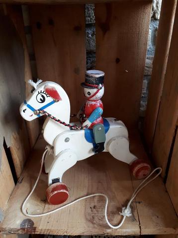 Ruiter op paard oud trekpopje beschikbaar voor biedingen