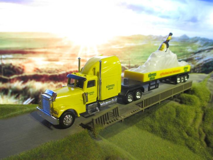 Peterbilt platte oplegger Küppers Kölsch 2005 uitgave, Hobby en Vrije tijd, Modelauto's | 1:87, Nieuw, Ophalen of Verzenden