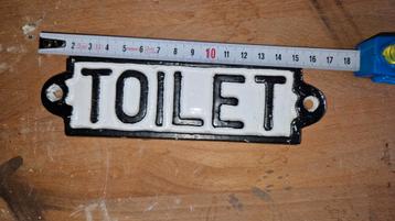 Toilet bordje