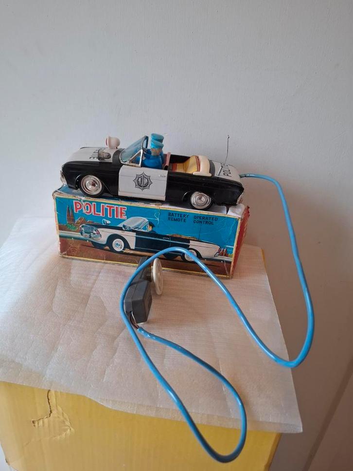 Ichiko Japan Ford Taunus Politiewagen voor de Nederlandse, Antiek en Kunst, Antiek | Speelgoed, Ophalen of Verzenden