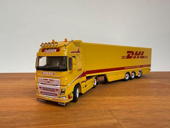 WSI Volvo FH4 Globetrotter 4x2 3-as opl. Tijssen DHL 1:50, Hobby en Vrije tijd, Modelauto's | 1:50, Zo goed als nieuw, Bus of Vrachtwagen