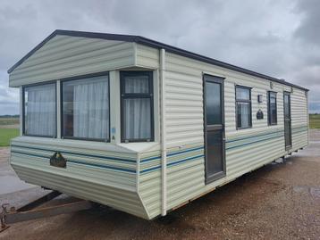 Ruime caravan in keurige staat 10,6 x 3,7 m beschikbaar voor biedingen