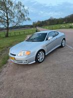 Hyundai Coupe 2.0 2002 Grijs, Auto's, Hyundai, Origineel Nederlands, Te koop, Zilver of Grijs, 1400 kg