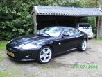 Jaguar XK 4.2 Coupe AUT 2008 Zwart, Auto's, 4 stoelen, Zwart, Leder, 298 pk