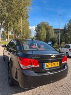 Chevrolet Cruze 1.8 AUT 2010 Zwart, Auto's, Chevrolet, 65 €/maand, Stof, 1290 kg, 1796 cc