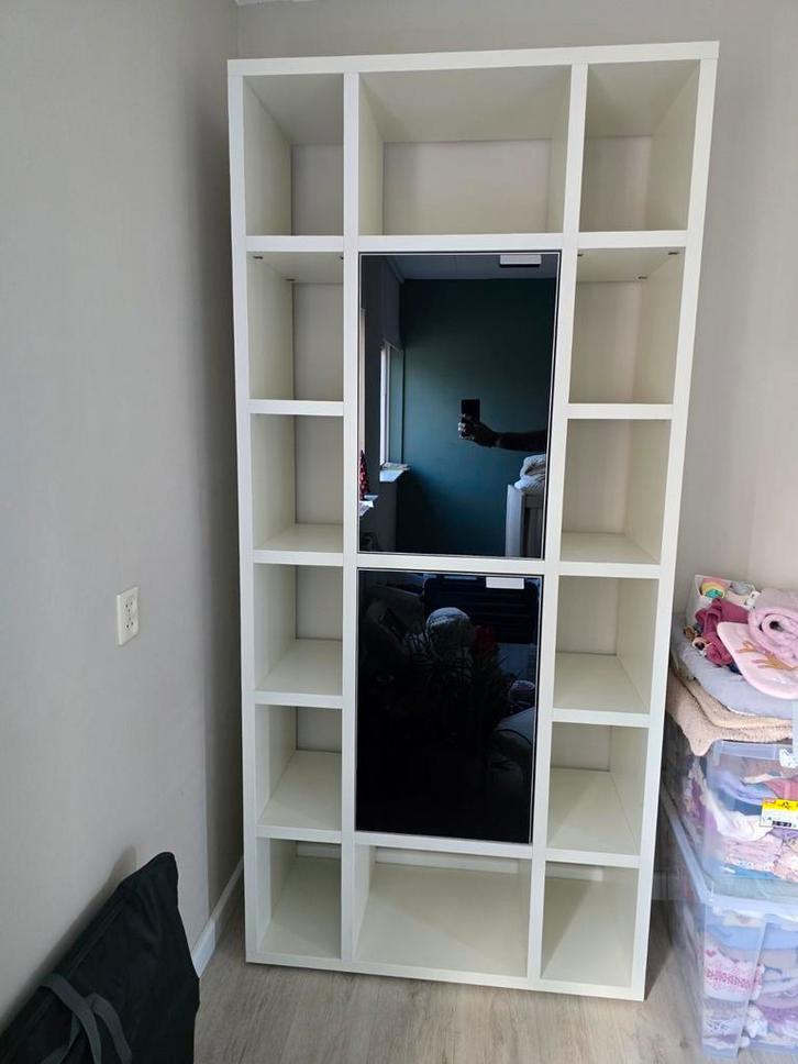 Witte Hülsta design kast - Hoogglans zwarte deuren, Huis en Inrichting, Kasten | Wandmeubels, Zo goed als nieuw, 200 cm of meer