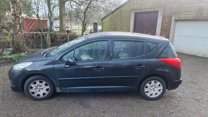 Peugeot 207 1.4 SW 2010 Zwart, Auto's, Peugeot, Particulier, Airbags, Airconditioning, Bluetooth, Centrale vergrendeling, Elektrische ramen
