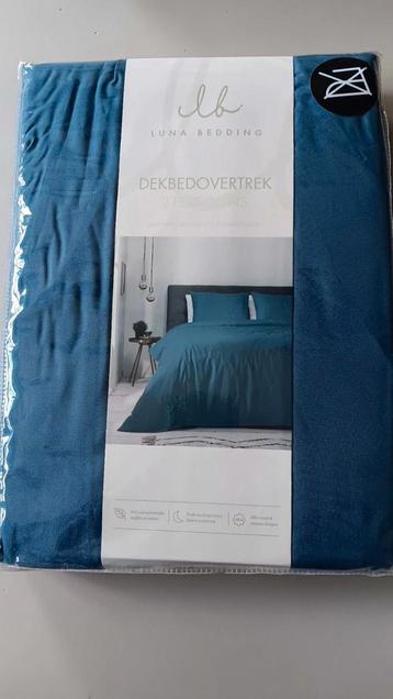 Nieuw blauw dekbedovertrek 200 x 220.
 beschikbaar voor biedingen