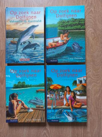 Boeken Op zoek naar dolfijnen, €1,- per stuk of 4 voor €3,-