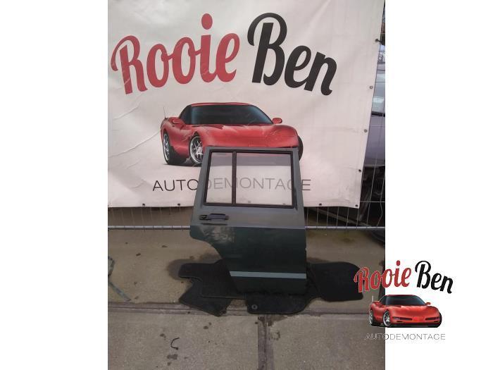 Portier 4Deurs rechts-achter van een Jeep Cherokee, Auto-onderdelen, Carrosserie en Plaatwerk, Deur, Jeep, Gebruikt, 3 maanden garantie