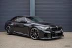 BMW M2 G87 | Carbon dak | Camera | Head up | HK | Sportstoel, Automaat, Achterwielaandrijving, Zwart, 2993 cc
