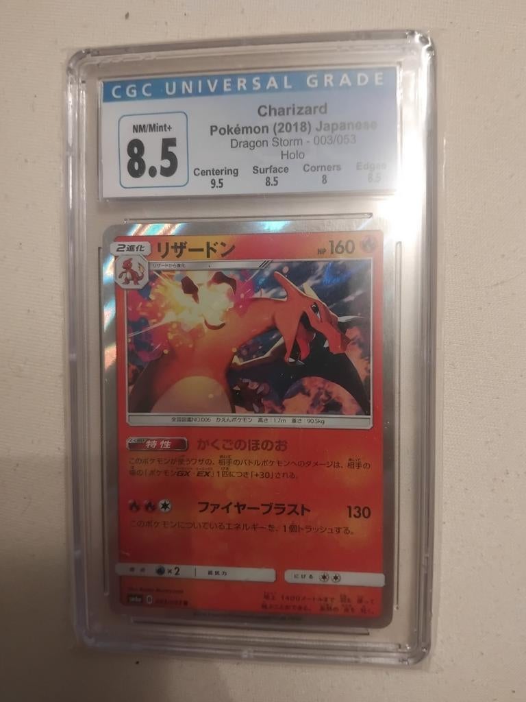 Charizard (2018) Japanese Dragon Storm Holo CGC 8.5, Ophalen of Verzenden, Zo goed als nieuw, Losse kaart, Foil