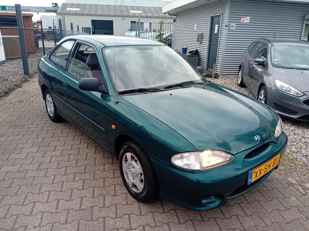 Hyundai Excel 1.5 GS HB BJ1999 UNIEK! 104DKM! NIEUWE APK!, Voorwielaandrijving, Stof, 31 €/maand, Airbags