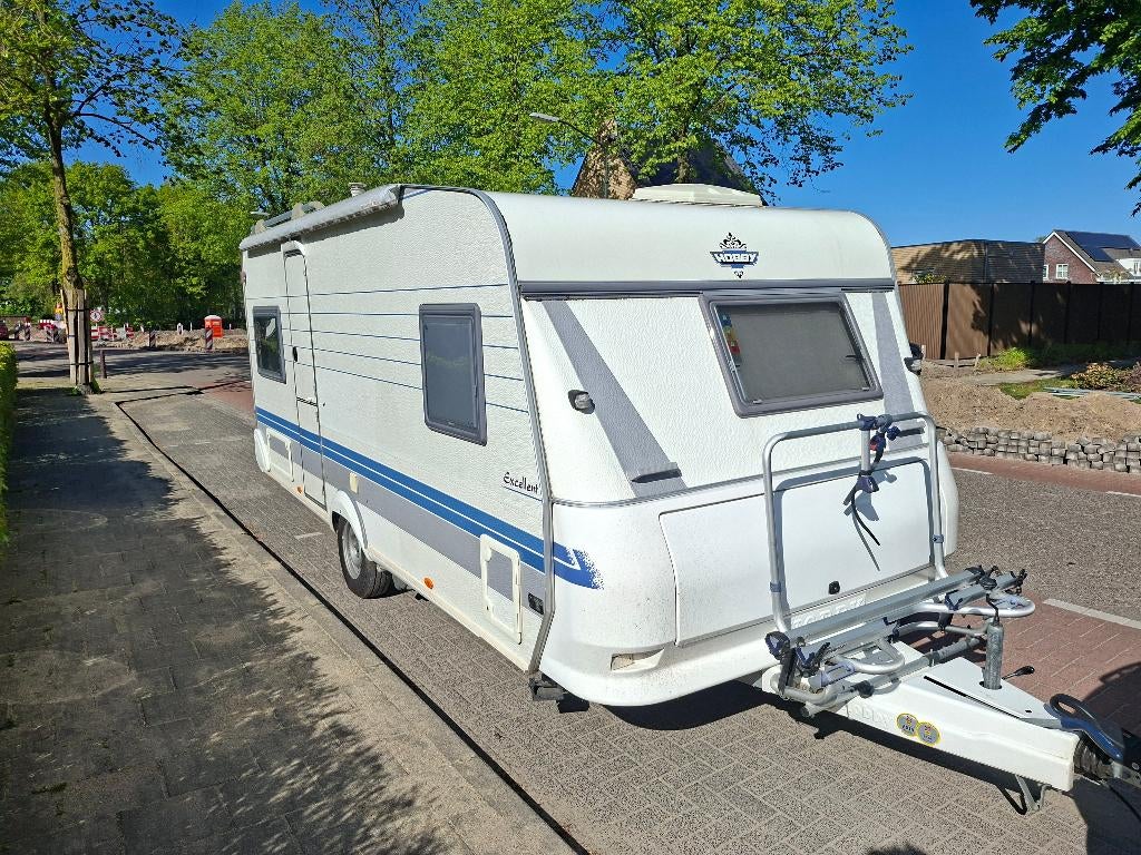 Te koop mooie Hobby Excellent 495 Ufe 2000, Caravans en Kamperen, Caravans, Particulier, tot en met 4, 1000 - 1250 kg, Rondzit