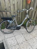 Mooie Dames Elektrische fiets met Middenmotor, Fietsen en Brommers, Zo goed als nieuw, 50 km per accu of meer, 55 tot 59 cm, Ophalen