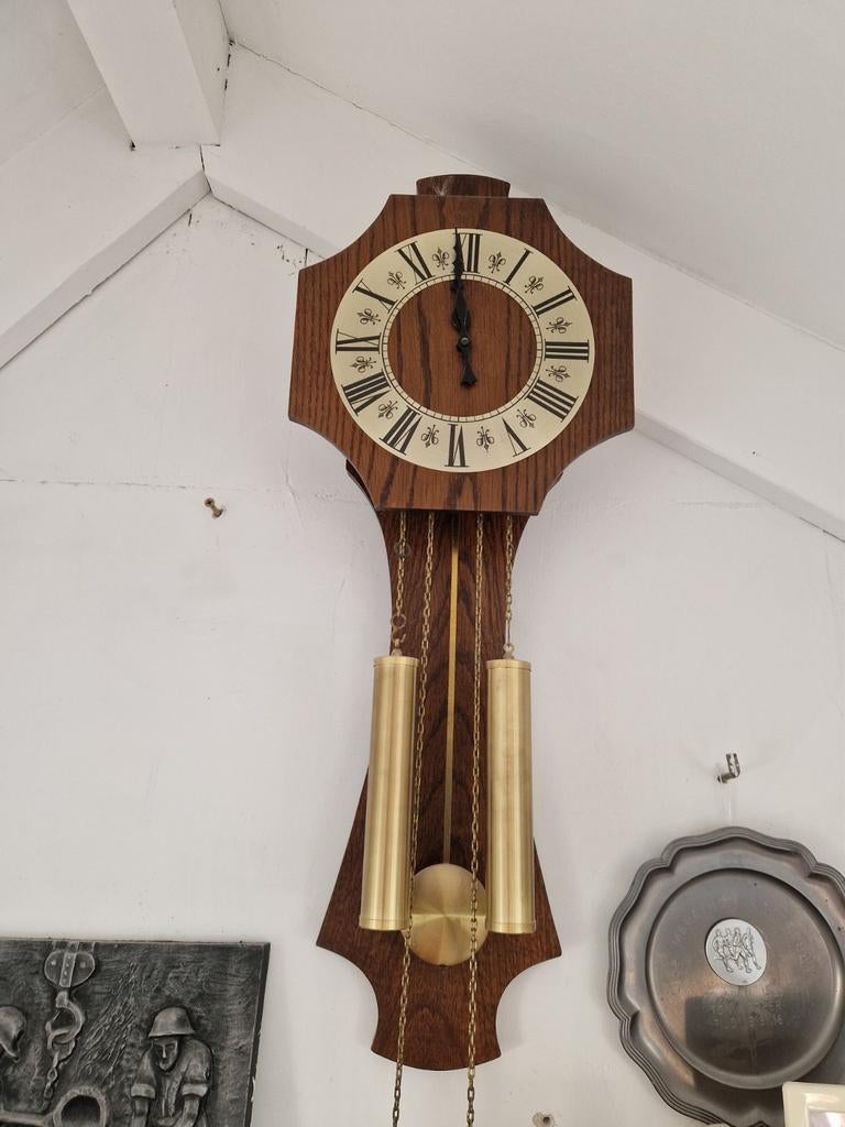 Zaanse klok, Ophalen