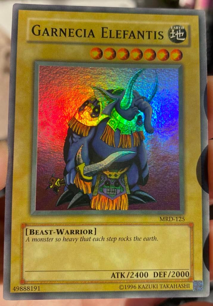 Yu-Gi-Oh! Garnecia Elefantis MRD Heavy US Faded Misprint, Ophalen of Verzenden, Gebruikt, Losse kaart, Foil